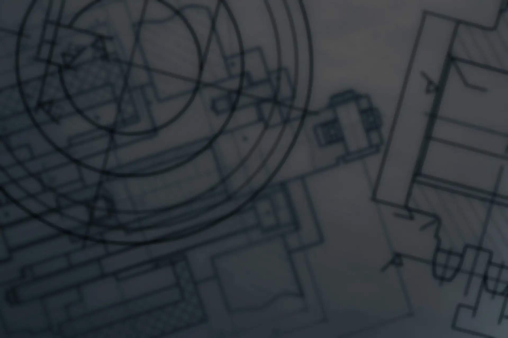 Blueprints of architectural plans featuring geometric shapes and detailed technical drawings on a light background.