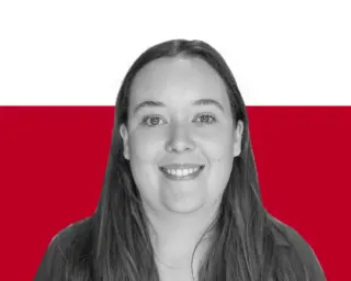 A black-and-white portrait of a woman with long straight hair, posed against a white and red background.