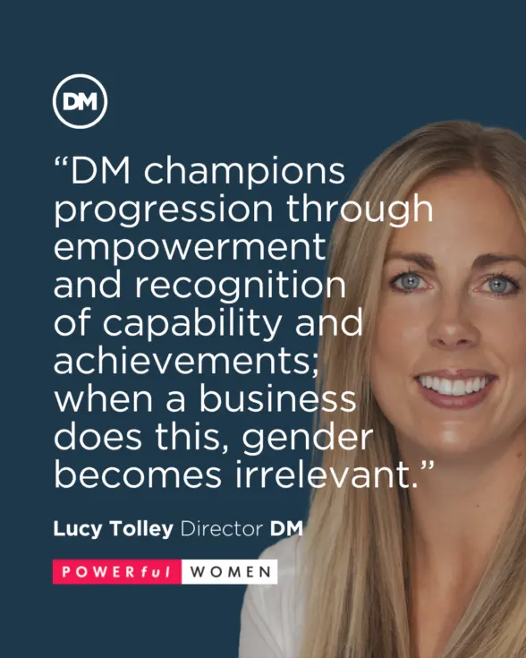 A woman with long blonde hair smiling against a dark blue background. Quotation text highlights her thoughts on gender equality in the workplace. Her name and title, "Lucy Tolley, Director DM," are displayed below, along with the phrase "POWERful WOMEN."